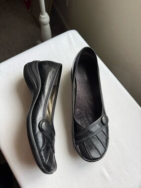 Black Leather Hush Puppies slip-on Loafers, likely the I-Loyal model size 10